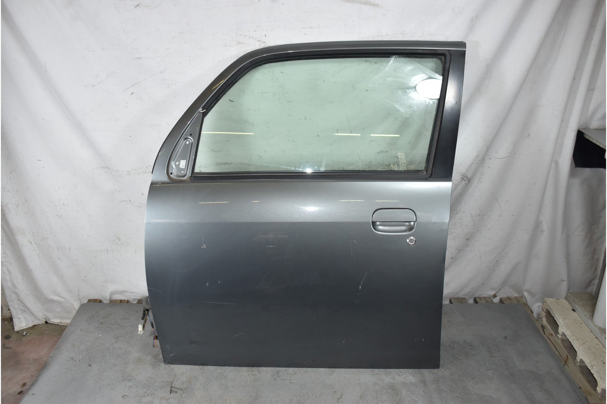 Portiera sportello anteriore SX Daihatsu Trevis Dal 2004 al 2010 Colore Grigio  1633703464894